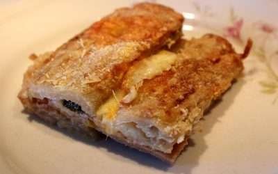 Parmigiana di coste con pastella di farro