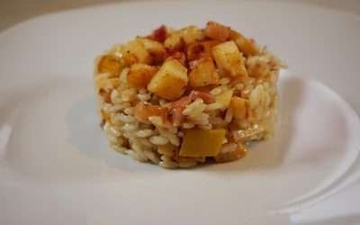 Risotto con mele cotogne e pancetta